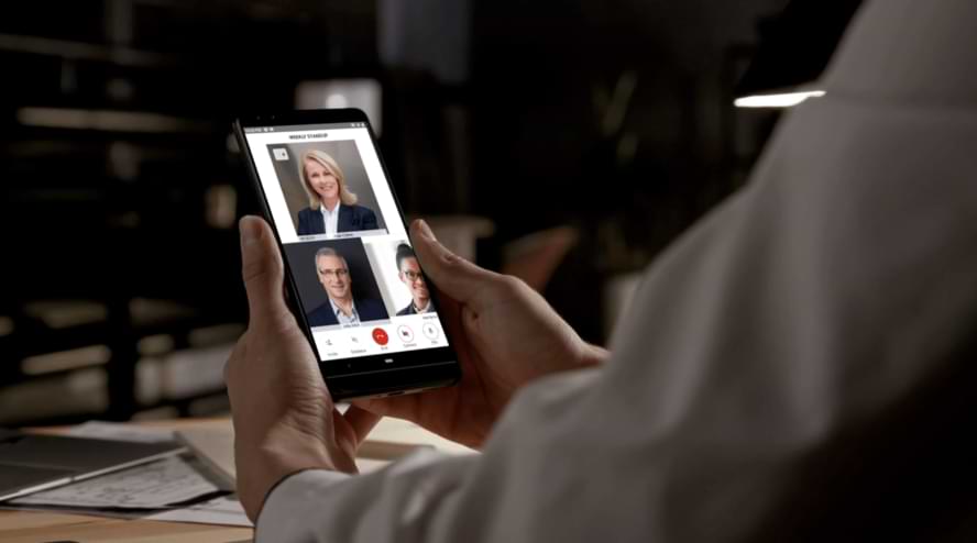 executive using wickr to have a video call from home